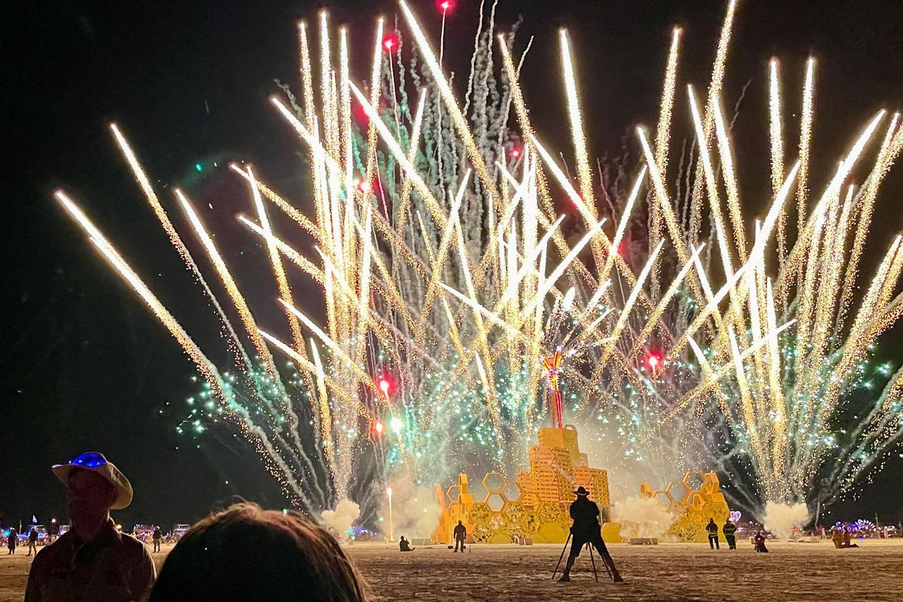 A security guard keeps people back during the annual Burning Man Festival on September 4, 2023