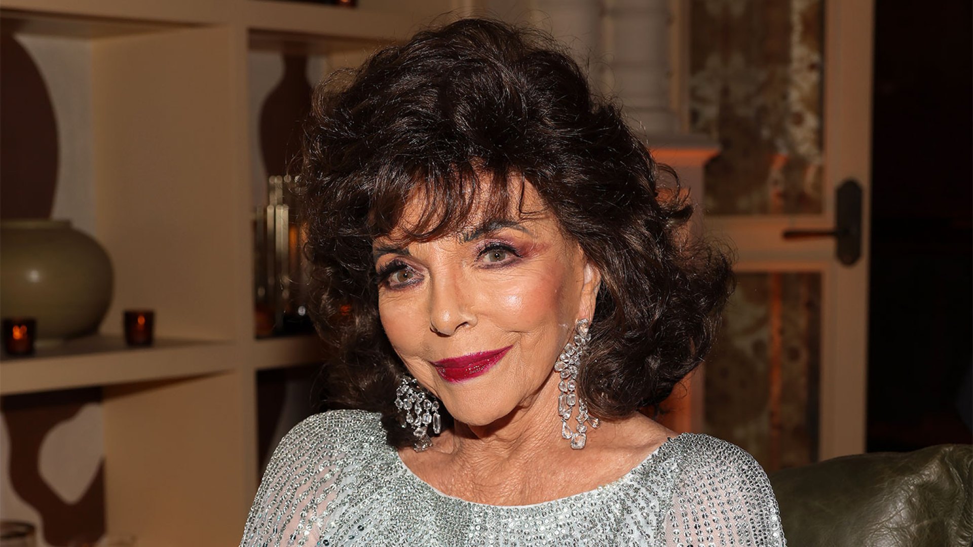 Feature-Joan-Collins-Serves-Timeless-Glamour-in-Swimsuit-and-White-Dress-With-Ex-Bond-Girl