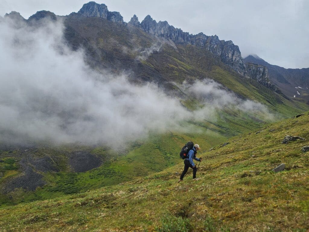 Hiker on steep hill
