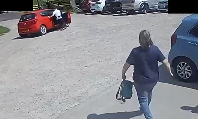 He caught hold of the vehicle, which had two passengers sitting in the rear seats