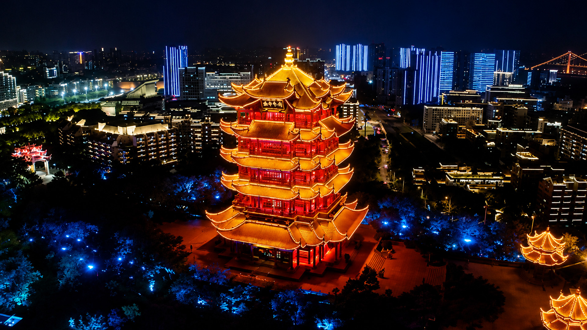 Wuhan’s traditional pagoda glowing above the night skyline