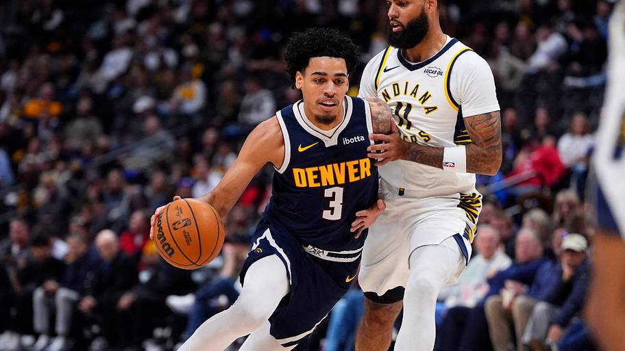 Nov 8, 2025; Denver, Colorado, USA; Indiana Pacers guard Andrew Nembhard (2) defends on Denver Nuggets guard Julian Strawther