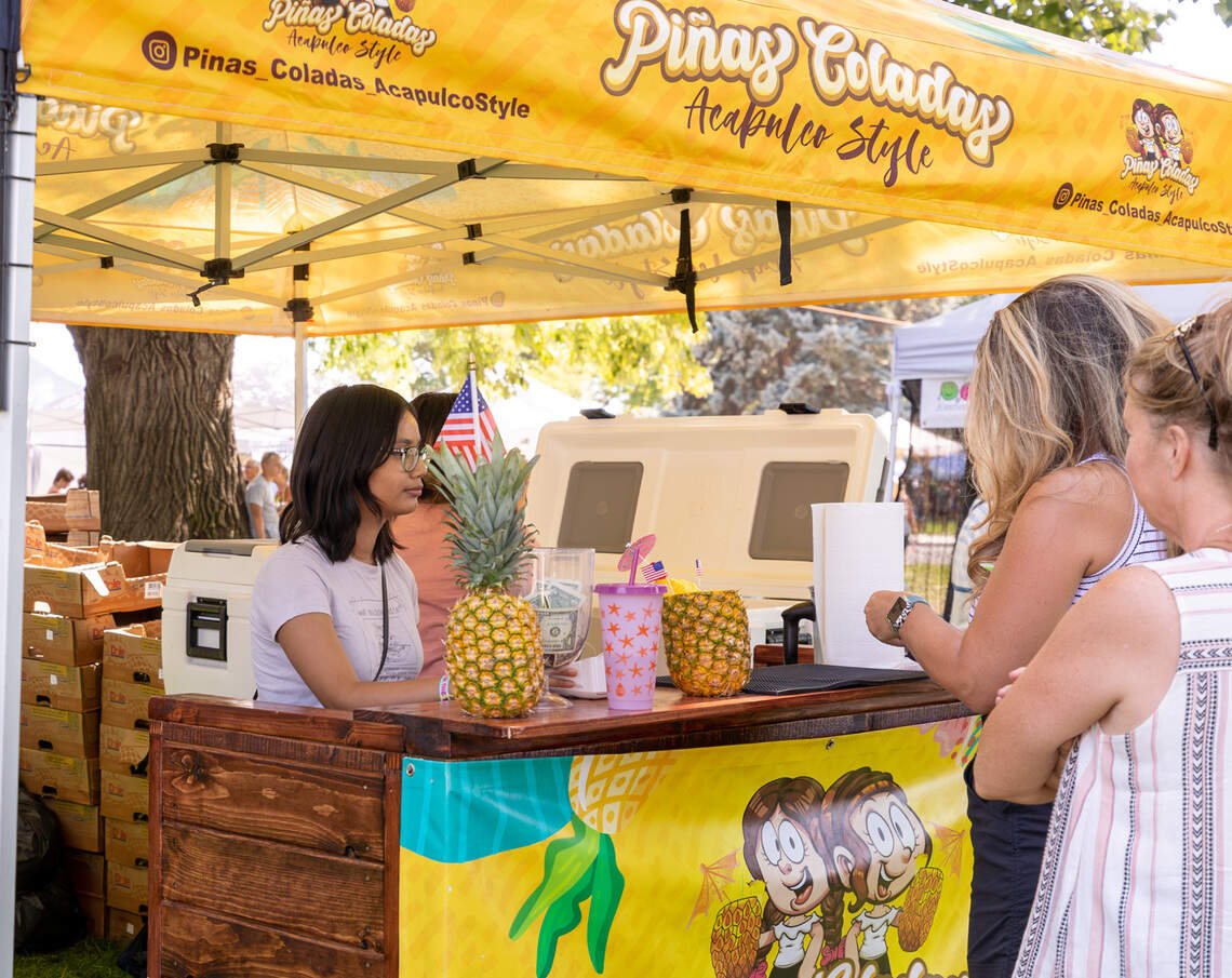 Attendees at the Art in the Park Festival were able to get Pinas Coladas Acapulco Style and other drinks at different booths in the park.