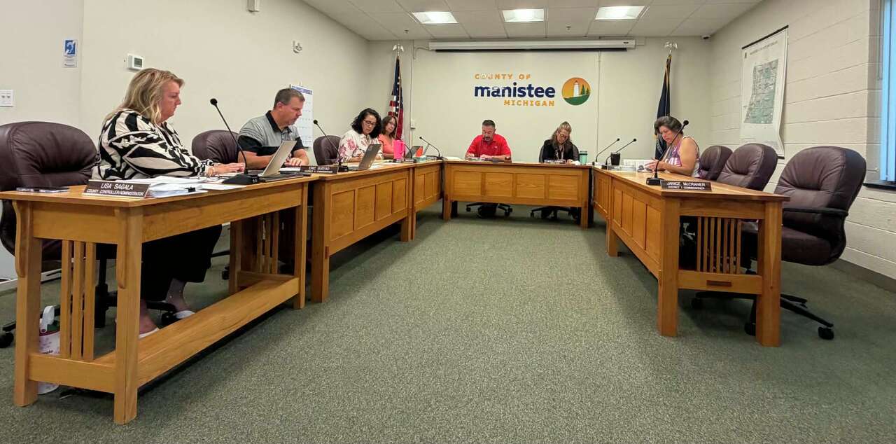 County reviews budget, approves health plan