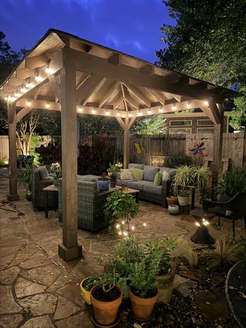 the string lights under a gazebo