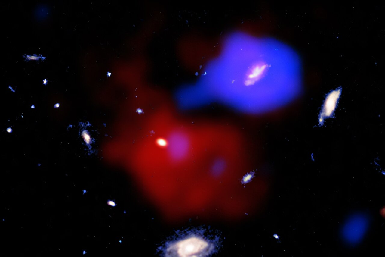 Black hole jet may be stirring gas cloud containing early 'red potato' galaxy
