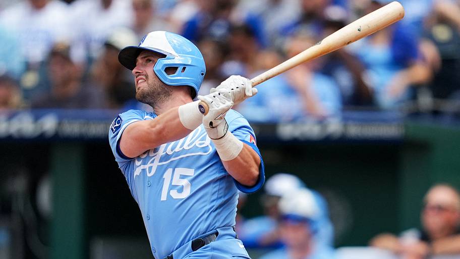 Kansas City Royals center fielder Lane Thomas (15) hits a home run.