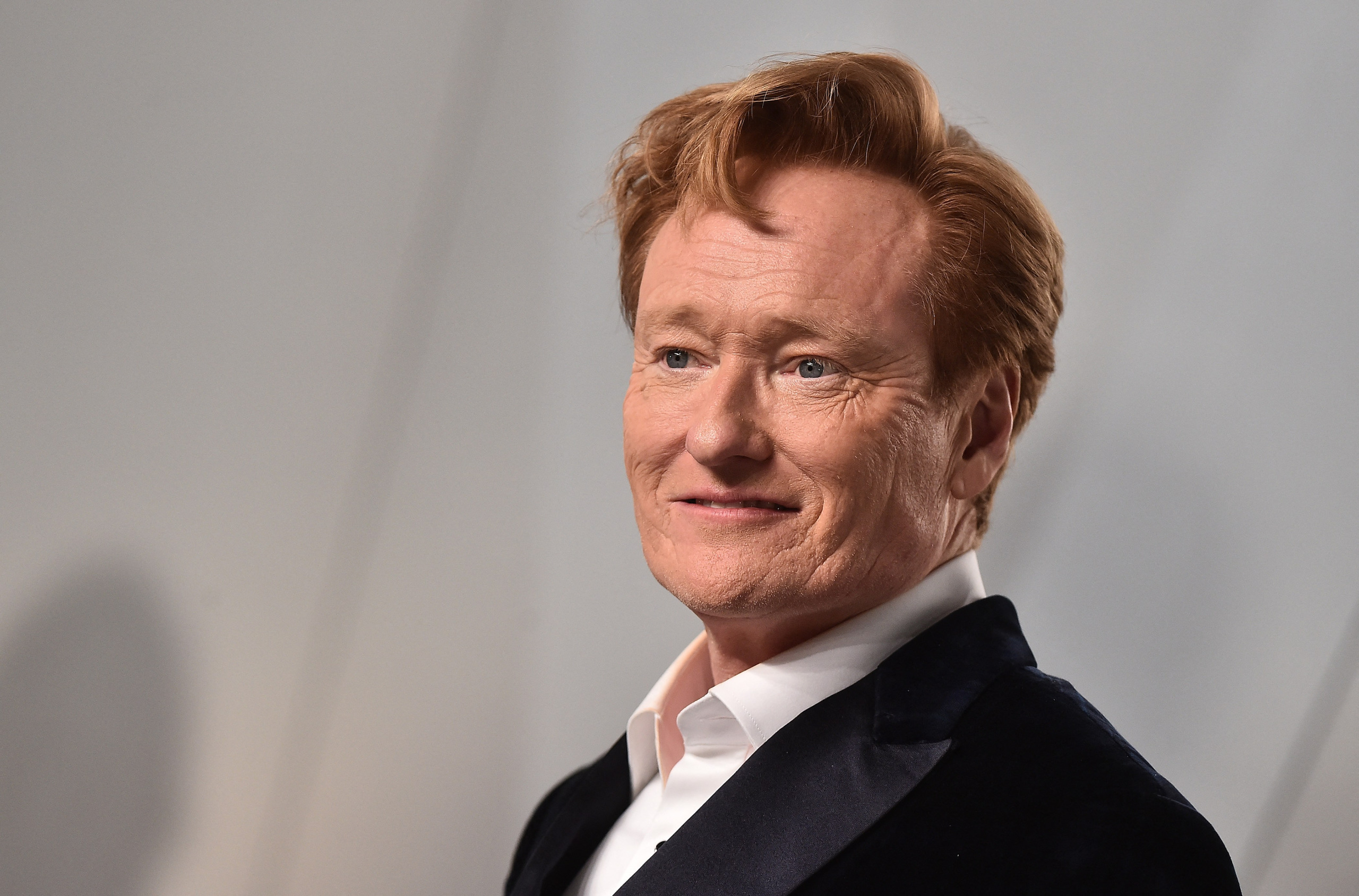 Conan O’Brien looks unrecognizable as he ditches signature hairdo