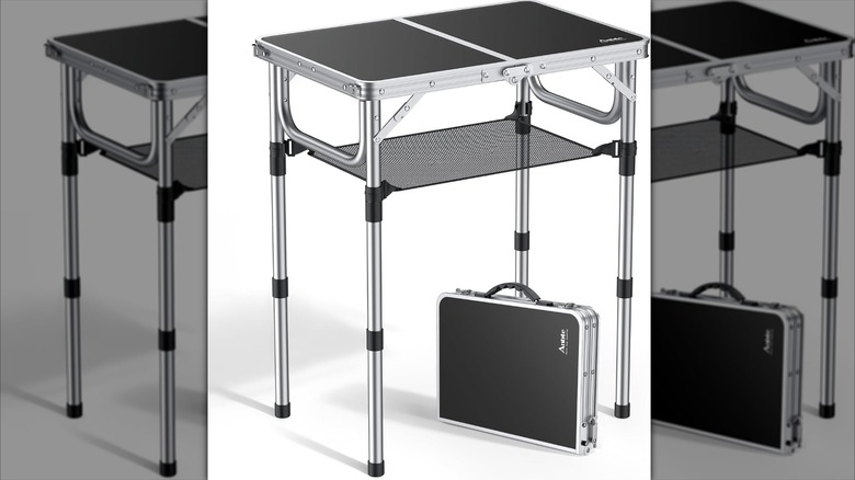 Antbe folding camping table on on white baackground