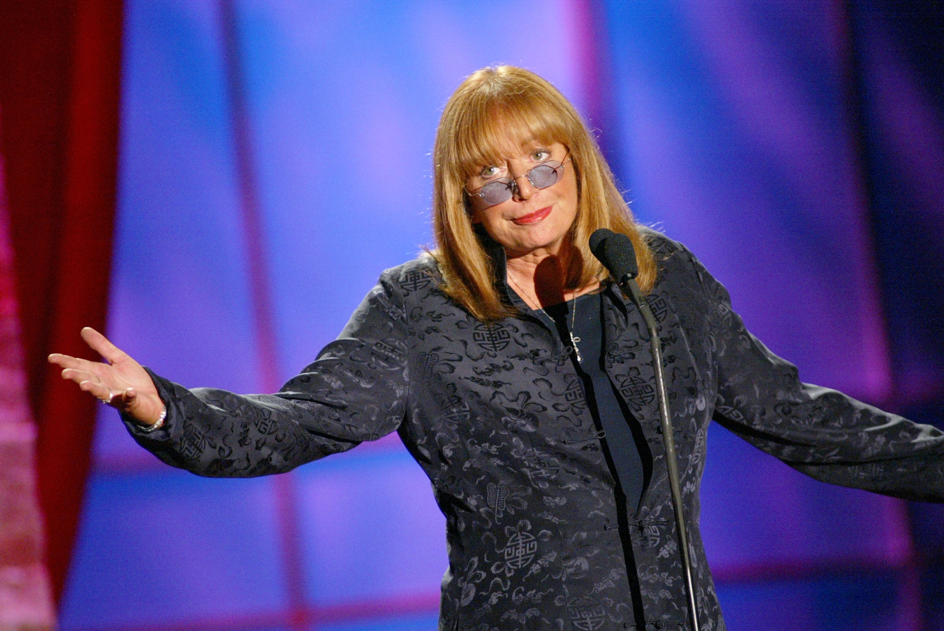Penny Marshall presents an award at the Women In Film's Crystal and Lucy Awards in Los Angeles in 2002. / Kevin Winter / Getty Images