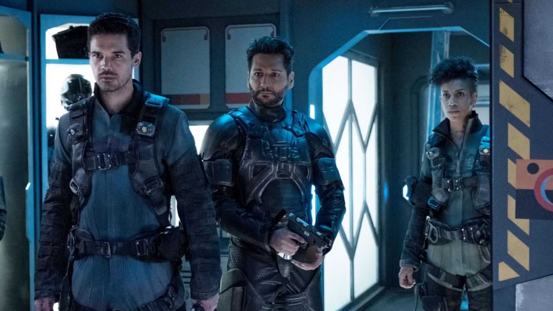 Holden, Alex, and Naomi suited up on the ship in The Expanse