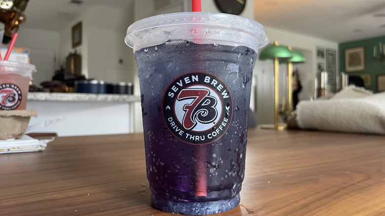 Black Mamba soda in a cup on a table