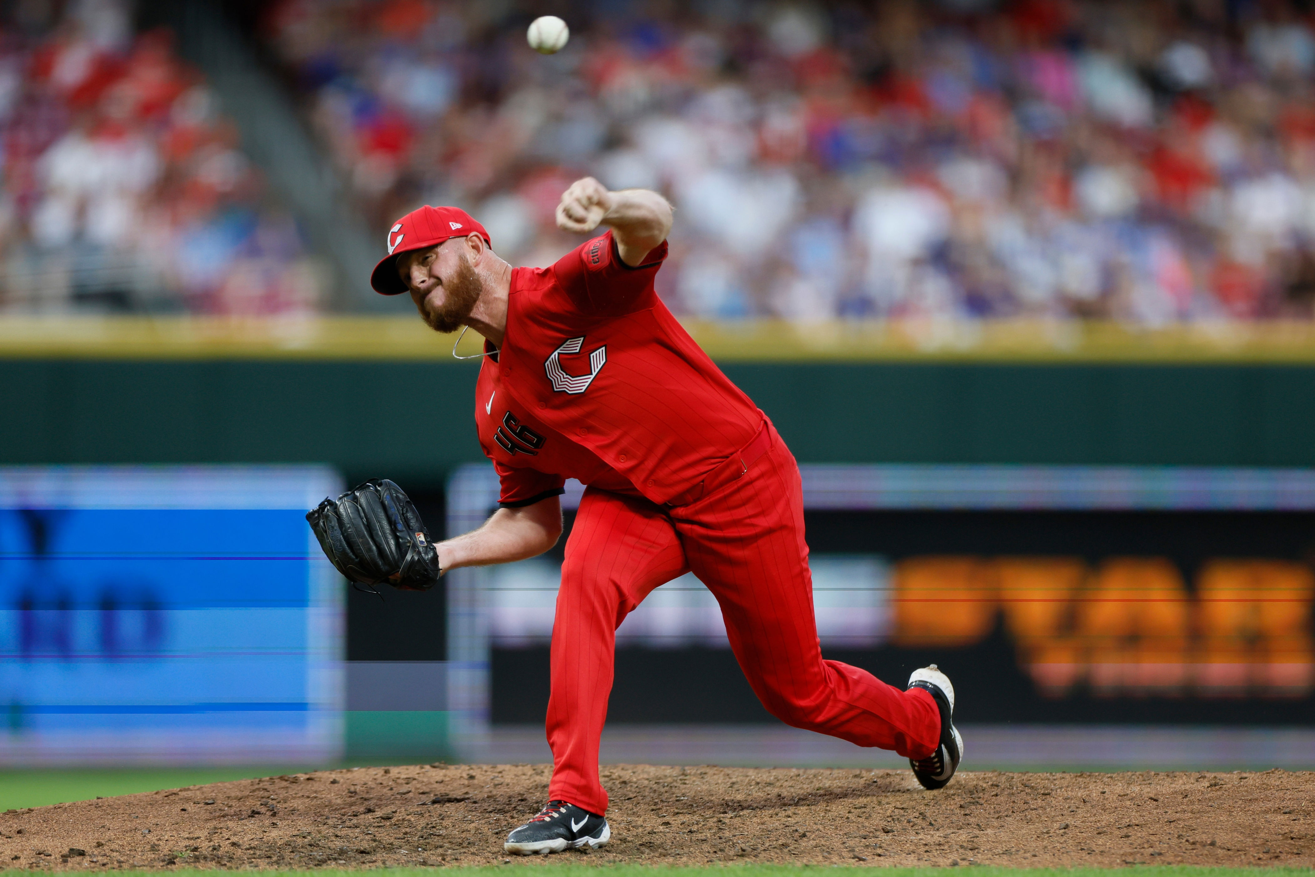Cincinnati Reds relief pitcher Caleb Ferguson throws against the Chicago Cubs during the sixth inning of a baseball game, Saturday, July 11, 2026, in Cincinnati. (AP Photo/Jay LaPrete)