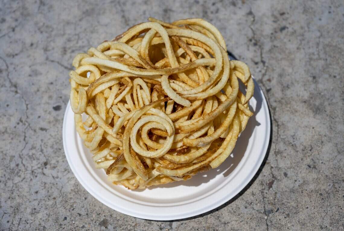 A mound of curly fries sold at the California State Fair in Sacramento on Friday, July 17, 2026.