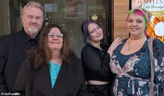 Leanne Laver (centre left with her family) was found dead inside her family home after a devastating fire on Wednesday afternoon