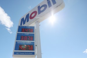 Gas prices are displayed at a Mobile Gas station on March 17, 2026
