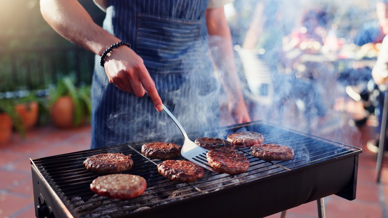 The Genius Way To Keep Your Burger Patty Juicy With Just One Ice Cube