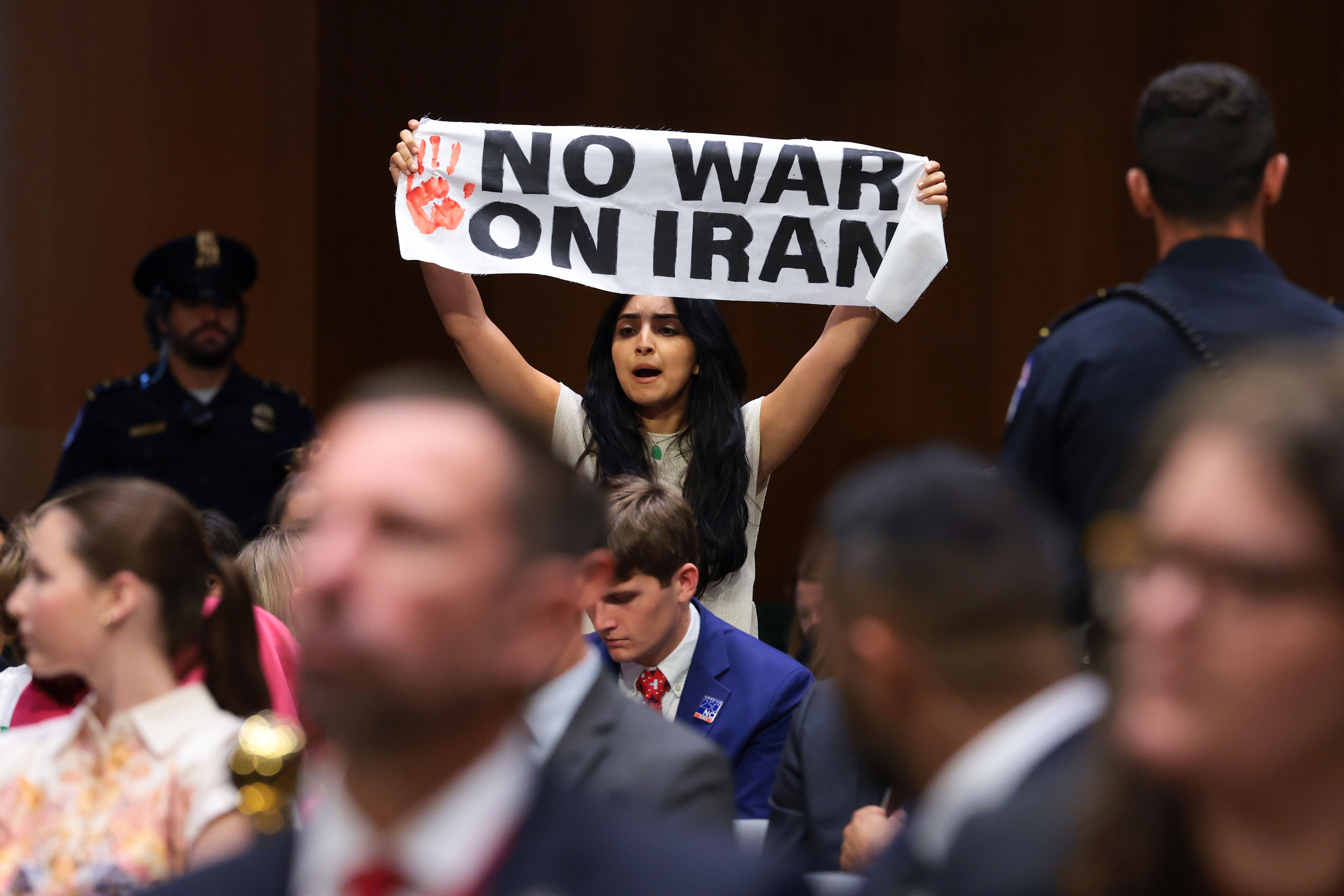 Several protesters immediately interrupted Hegseth’s opening remarks as he urged senators to approve a ‘necessary injunction’ of cash that is set to expand the Pentagon’s budget to $1.5 trillion (Getty)
