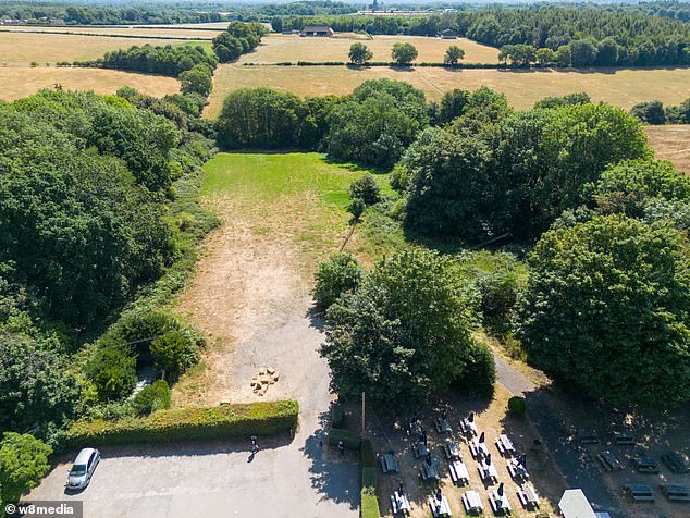 Pictured: A portion of land behind The Cock pub in Sarratt which is touted for newbuild homes