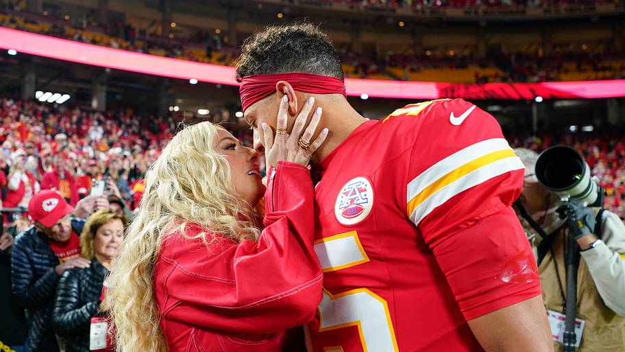 Patrick Mahomes greets wife, Brittany Mahomes.