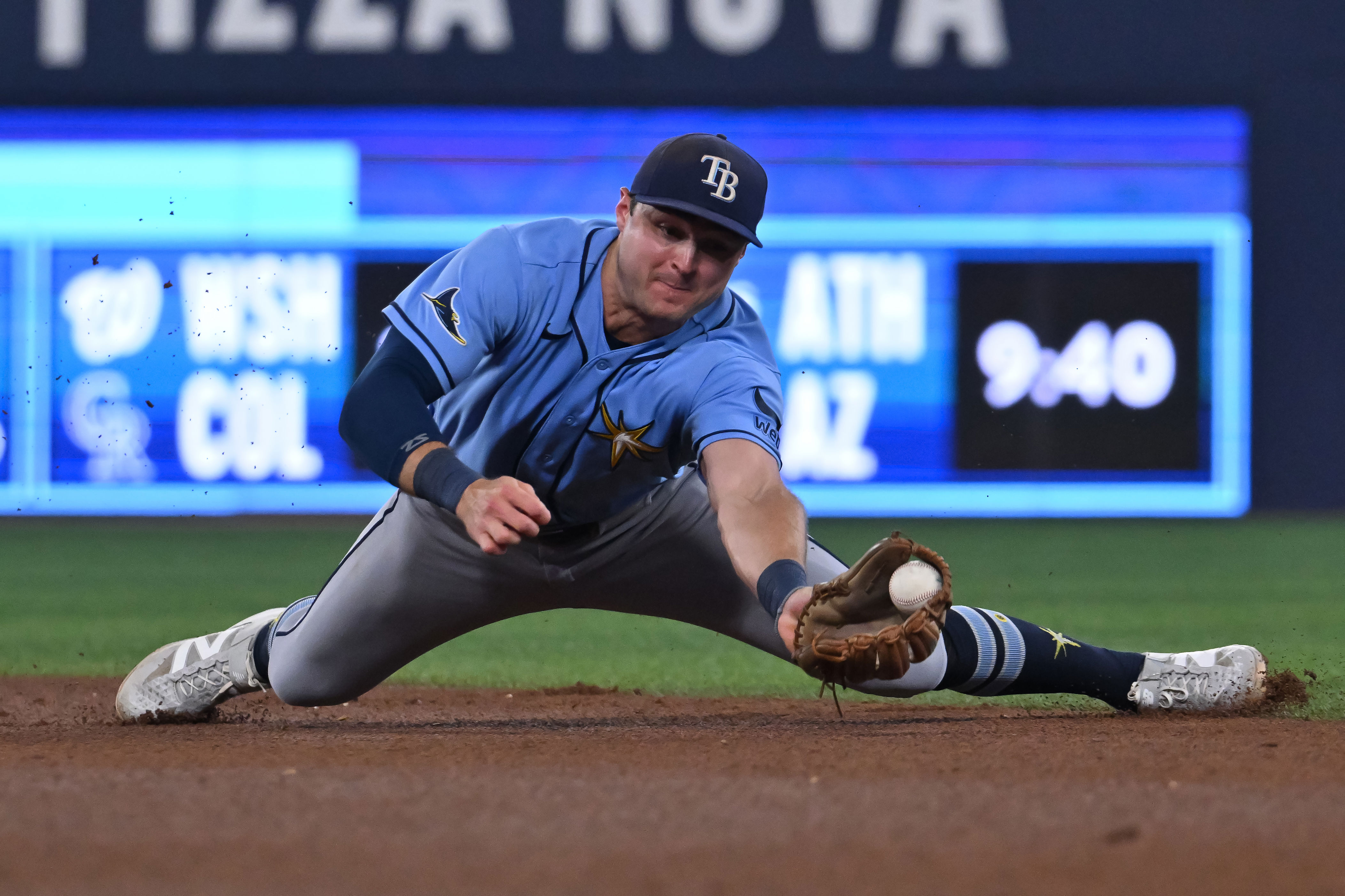 Tampa Bay Rays second baseman Ben Williamson catches a line drive off the bat of Toronto Blue Jays' Daulton Varsho for the out during the fourth inning of a baseball game in Toronto on Tuesday, July 21, 2026. (Jon Blacker/The Canadian Press via AP)
