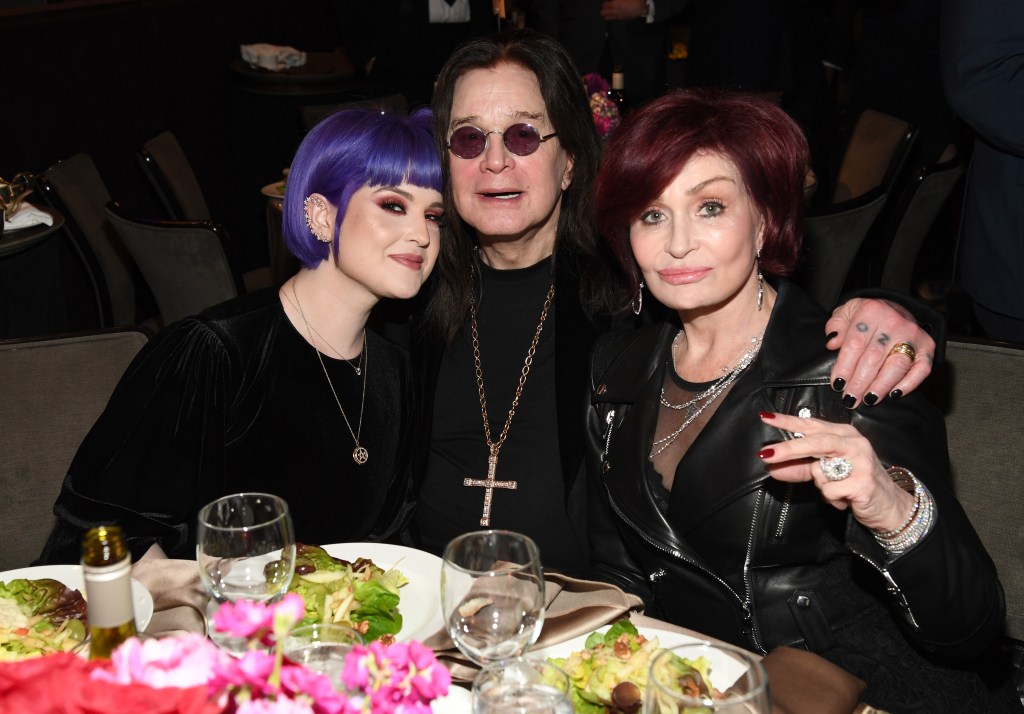 Kelly Osbourne, Ozzy Osbourne, and Sharon Osbourne pose together at the Pre-GRAMMY Gala.