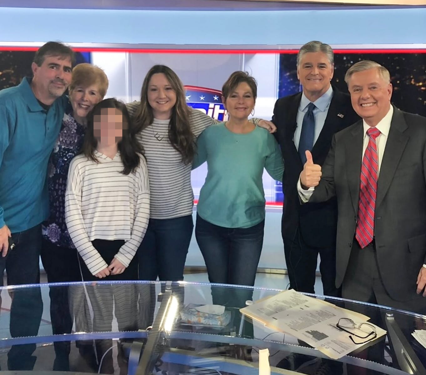 Darline Graham Nordone, husband Larry Nordone (left), his mother (second left), daughter Emillie (fourth from right), and her 17-year-old daughter with Larry, visit Sean Hannity with