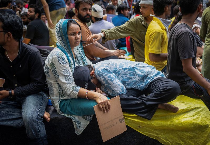Supporters of India's Cockroach Janta Party (CJP) demonstrate at a protest site in New Delhi