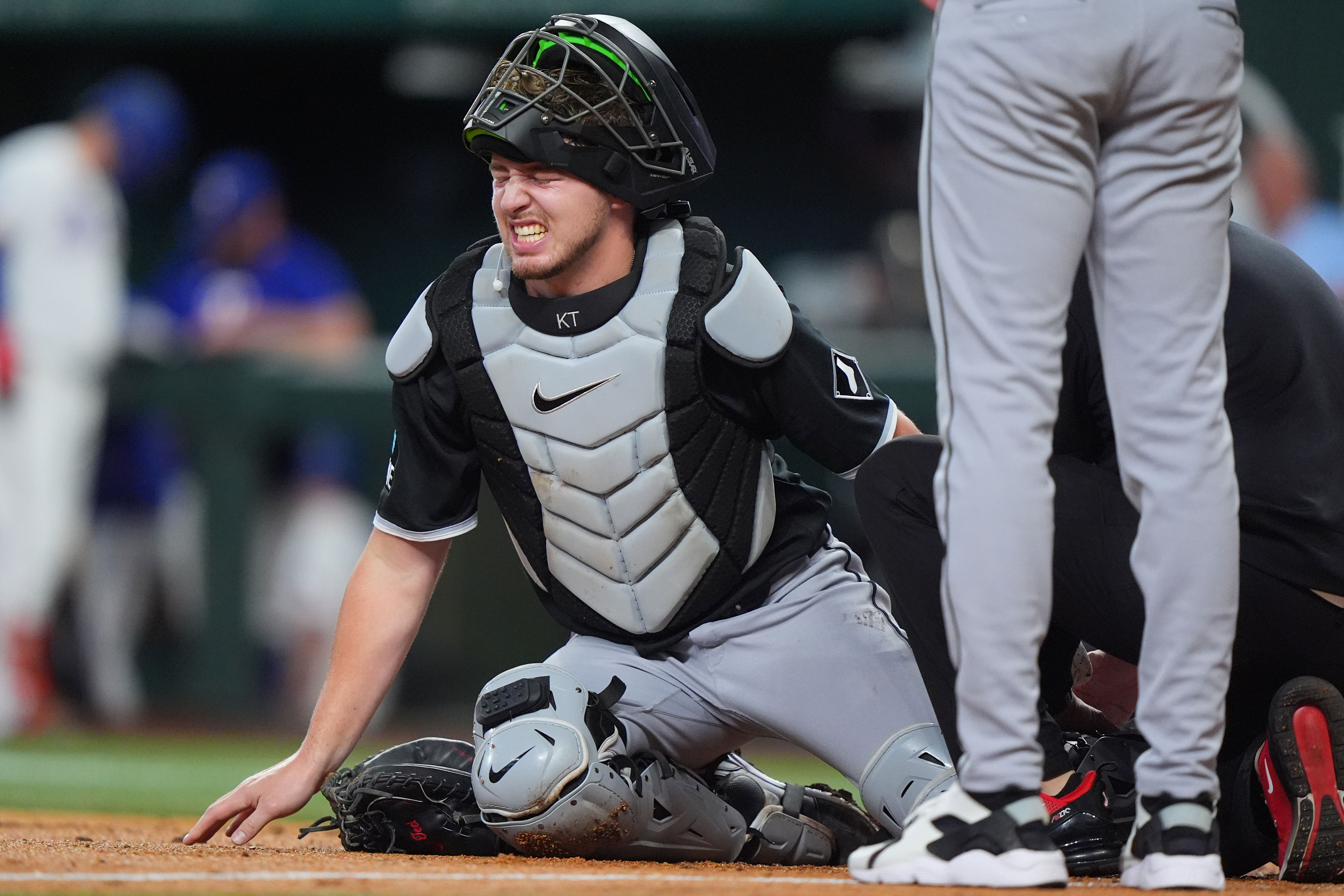 Chicago White Sox catcher Kyle Teel reacts before leaving a baseball game with an injury during the second inning against the Texas Rangers, Monday, July 20, 2026, in Arlington, Texas. (AP Photo/LM Otero)