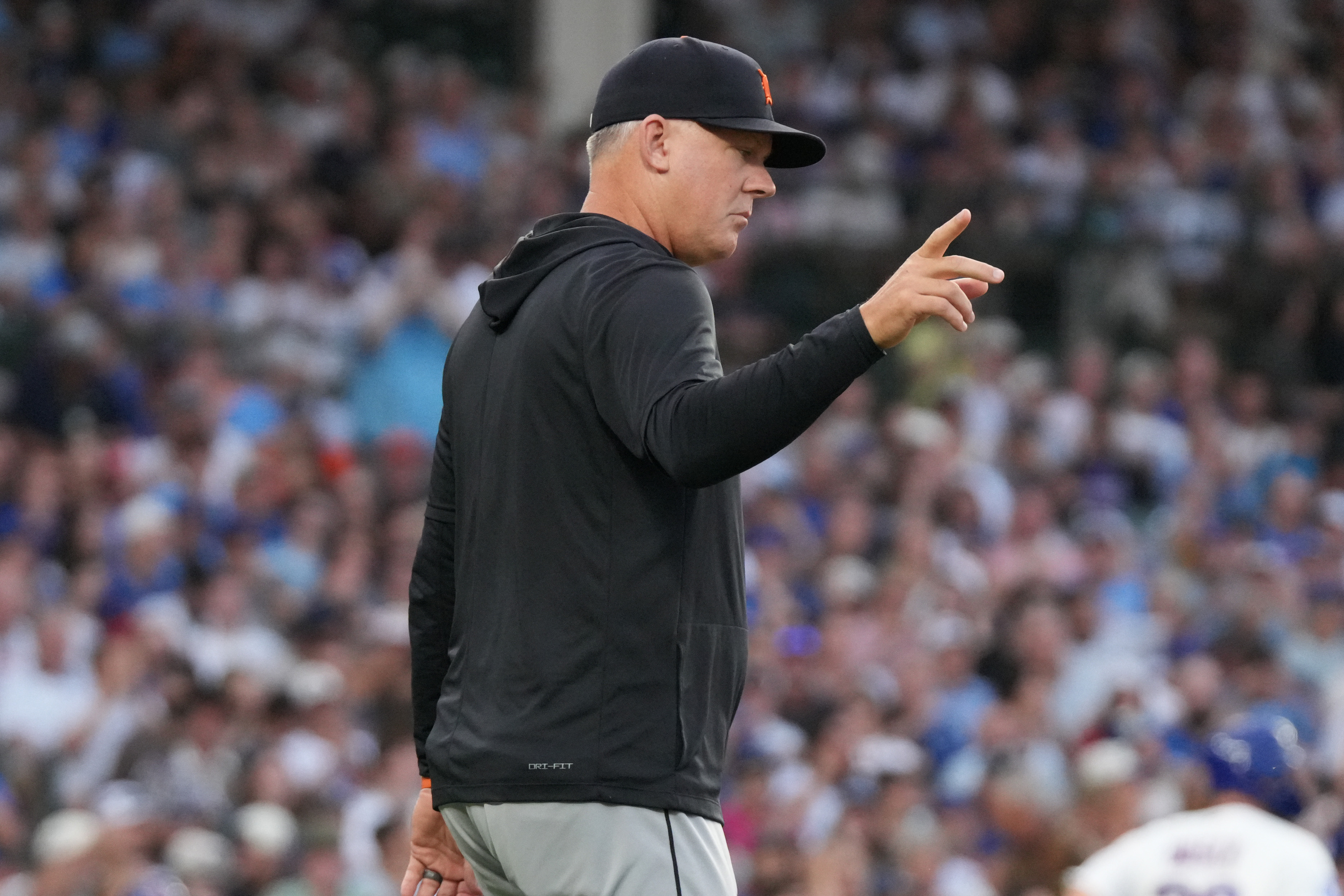 Detroit Tigers manager A.J. Hinch gestures as he makes a pitching change against the Chicago Cubs during the first inning of a baseball game Tuesday, July 21, 2026, in Chicago. (AP Photo/David Banks)