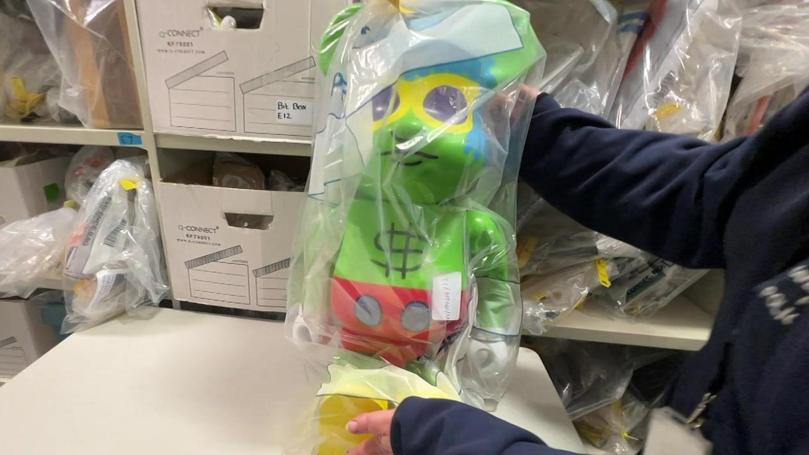 The items, including this rare bear figure, will be sold at auctions