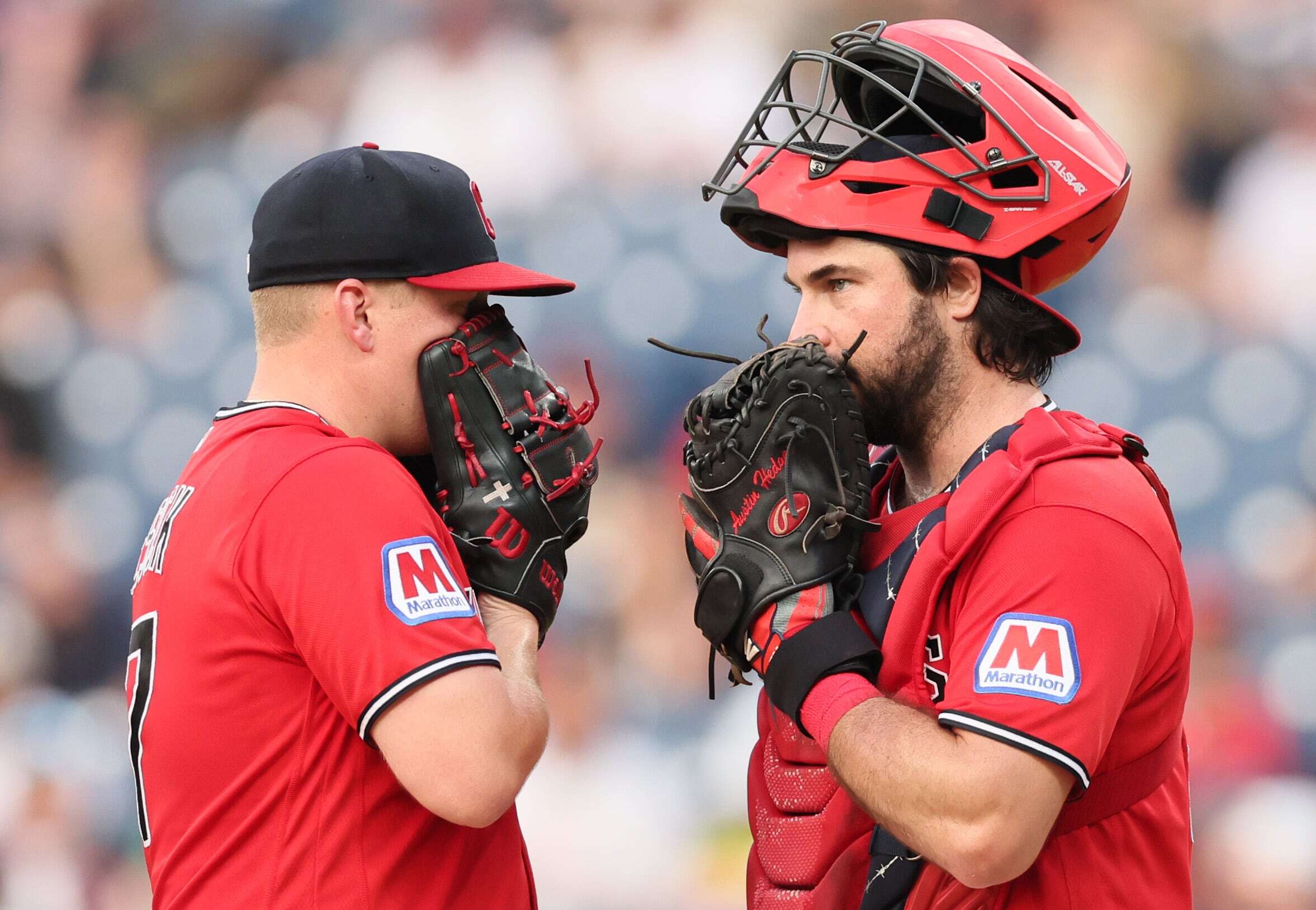 Cleveland Guardians pitcher Parker Messick (L) talks with Cleveland Guardians catcher Austin Hedges on the mound before Messick was pulled from the game in the sixth inning.