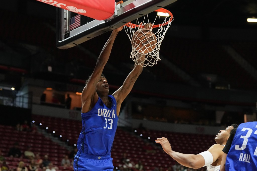 Jamarion Sharp #33 of the Dallas Mavericks dunks against the Orlando Magic in the first half of a 2025 NBA Summer League game at the Thomas & Mack Center on July 18, 2025 in Las Vegas, Nevada.
