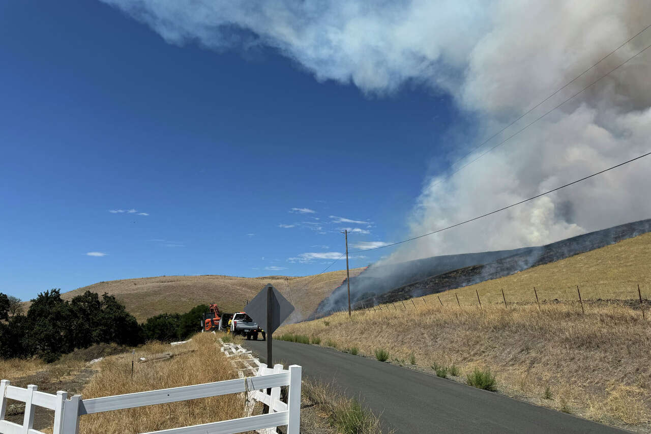 Fast-moving East Bay wildfire near Pleasanton forces evacuations, poses ‘serious threat' to homes