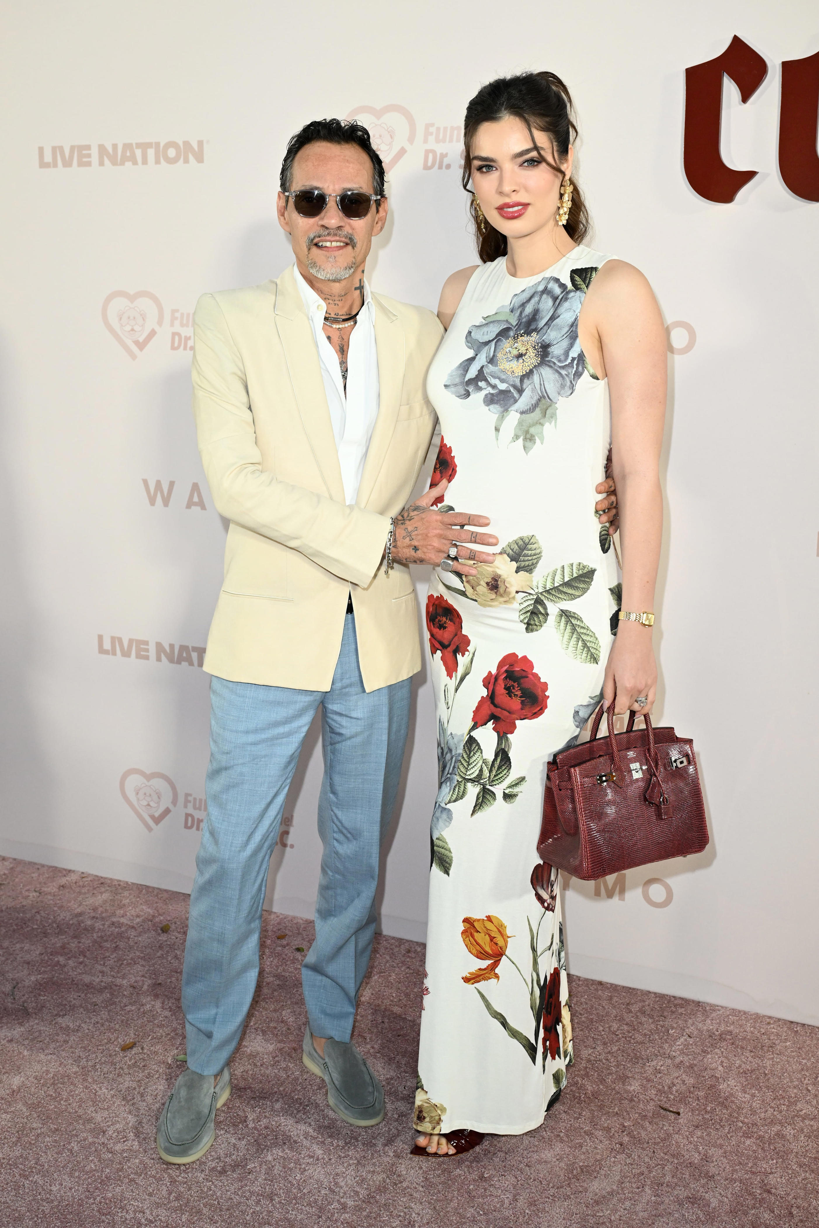 Marc Anthony and Nadia Ferreira attend Karol G's Con Cora Foundation's Con Cora Land Benefit Gala at Vizcaya Museum & Gardens on March 20, 2026 in Miami, Florida. (Photo by Jason Koerner/Getty Images)