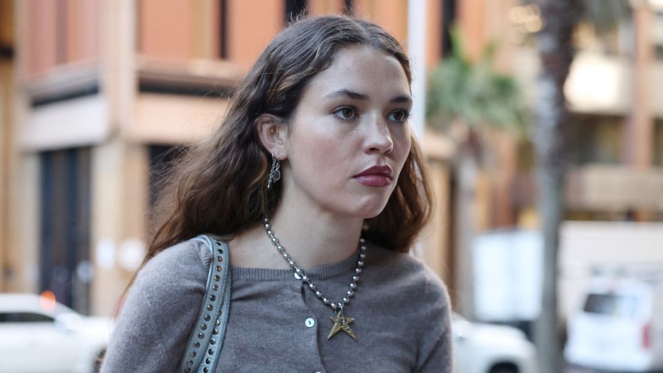 Actor Charlotte MacInnes outside a Sydney court during the defamation hearing. - Hollie Adams/Reuters