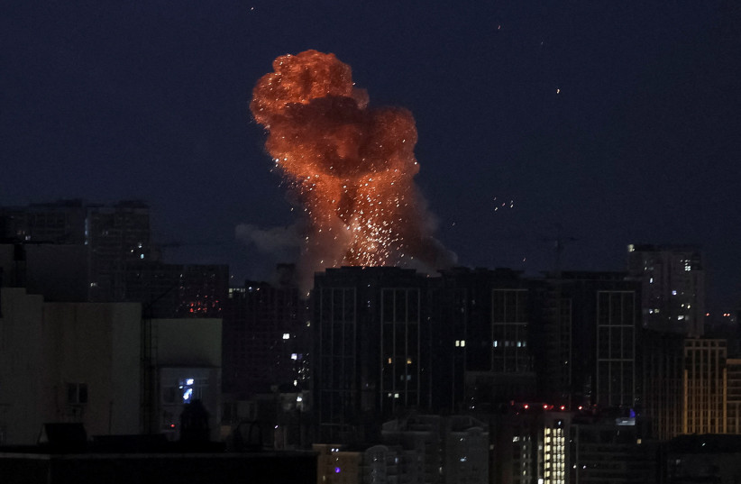 An explosion over the city during a Russian missile and drone strike, amid Russia's attack on Ukraine, in Kyiv, Ukraine July 6, 2026. (credit: REUTERS/GLEB GARANICH)