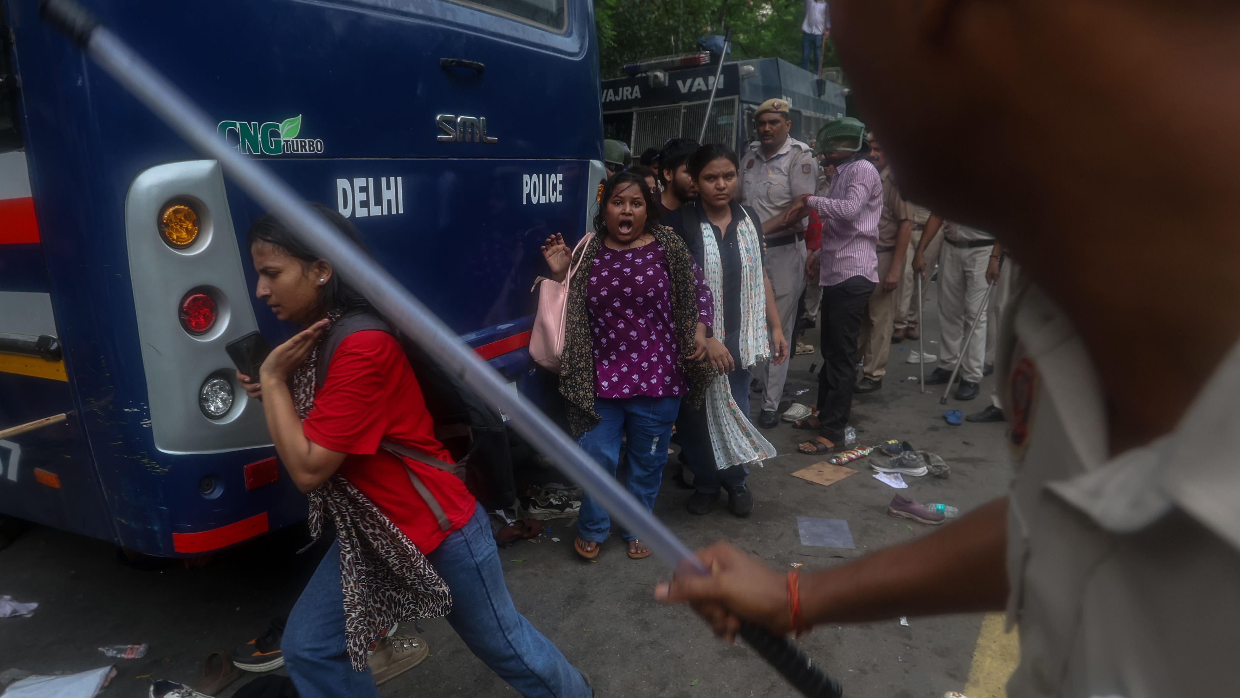 Police used force, including batons and tear gas, to disperse protesters