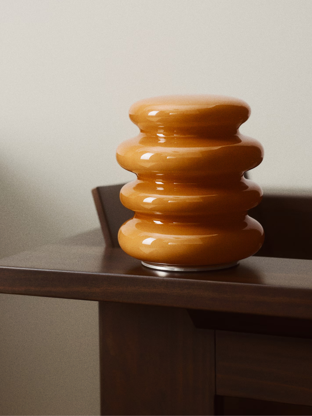 An amber rechargeable table lamp from H&M