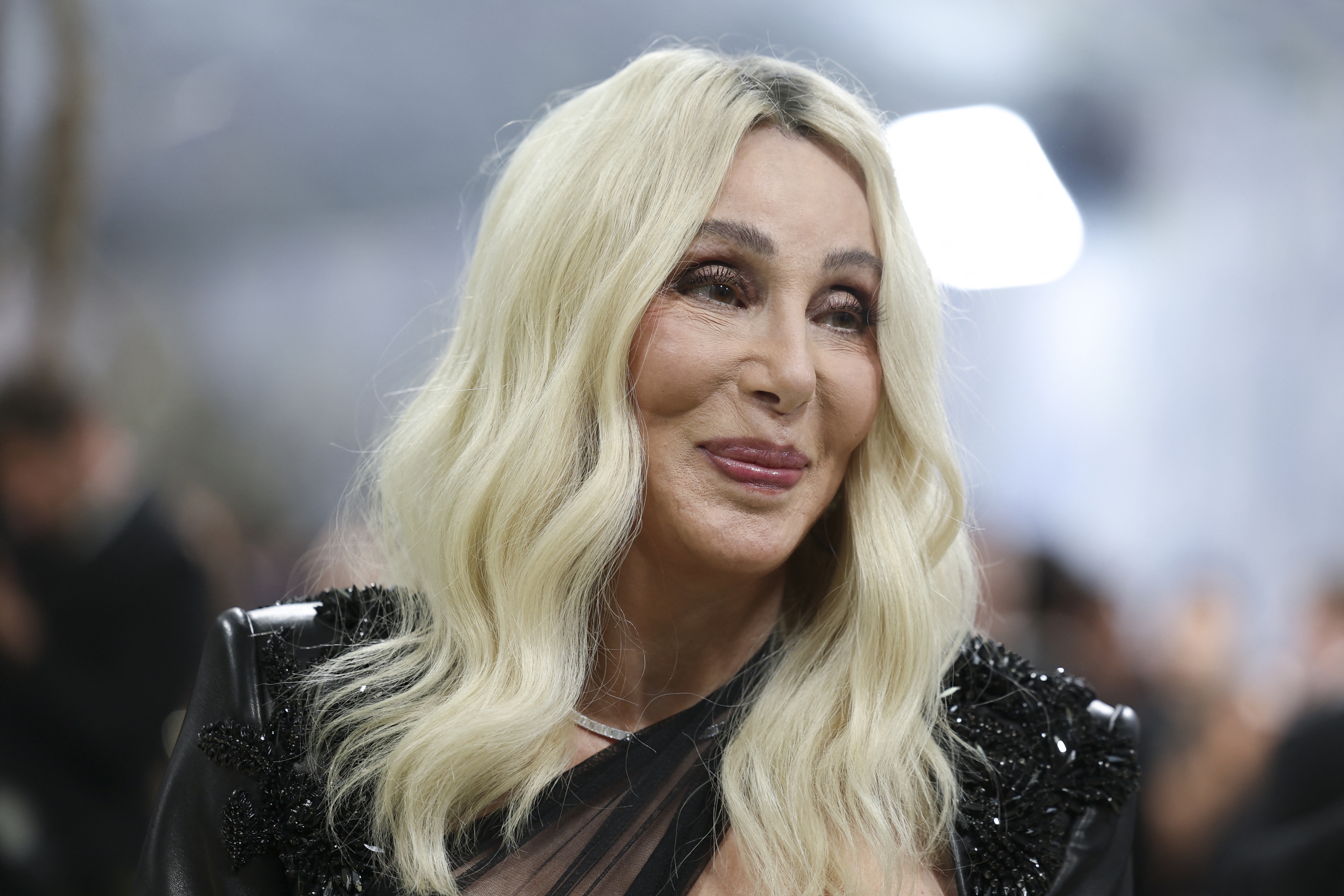 Cher wins royalties case against Sonny Bono's widow but must pay her own $1M legal bill