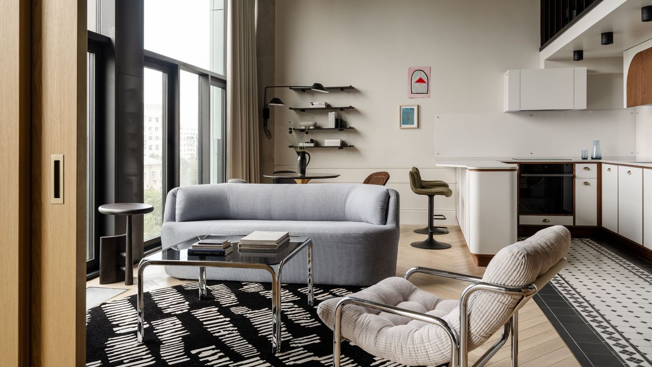 This Moscow home's ceiling couldn't be covered, so the designers built a whole second floor into it