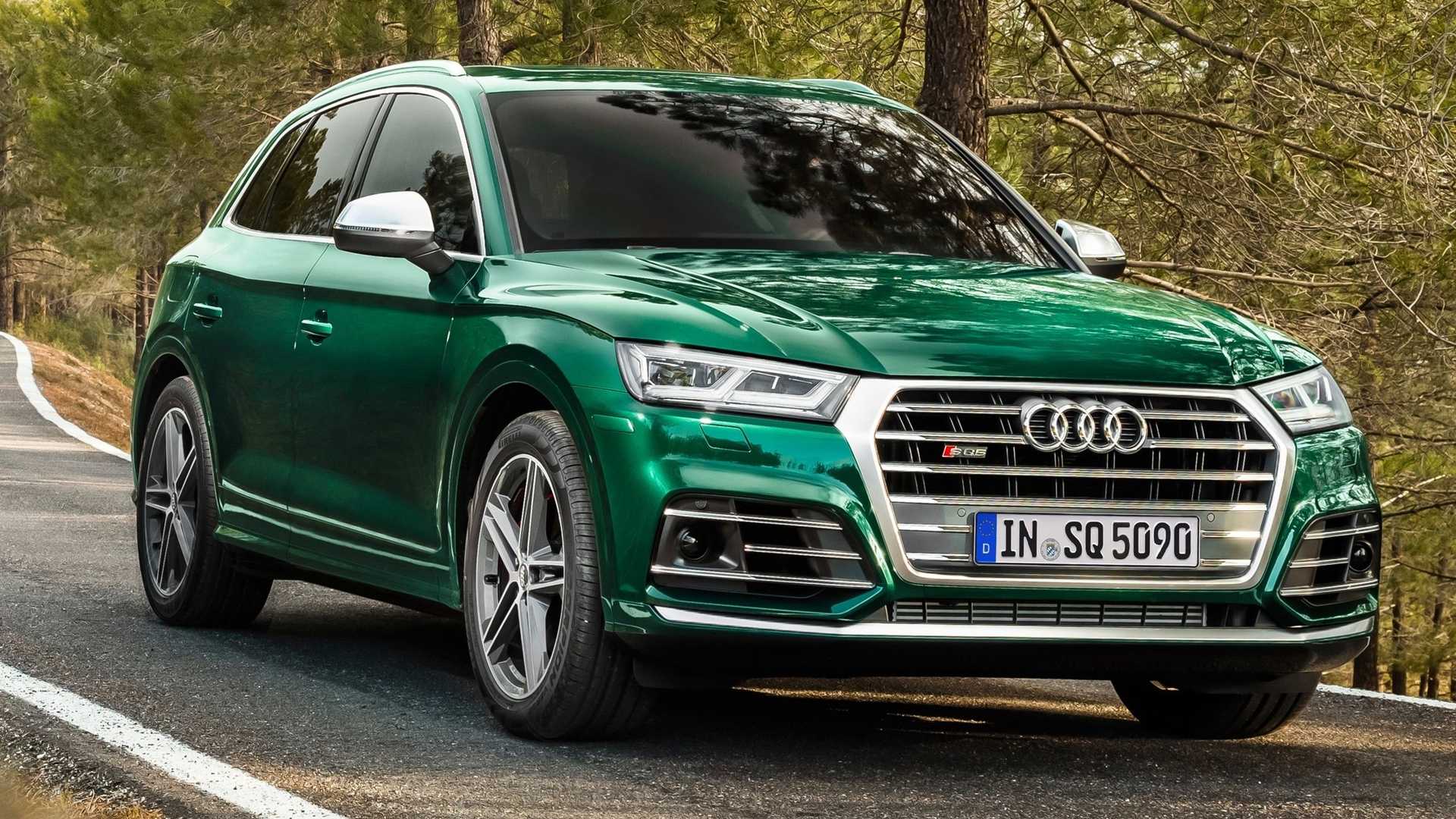 2019 Audi Q5 in green driving on road