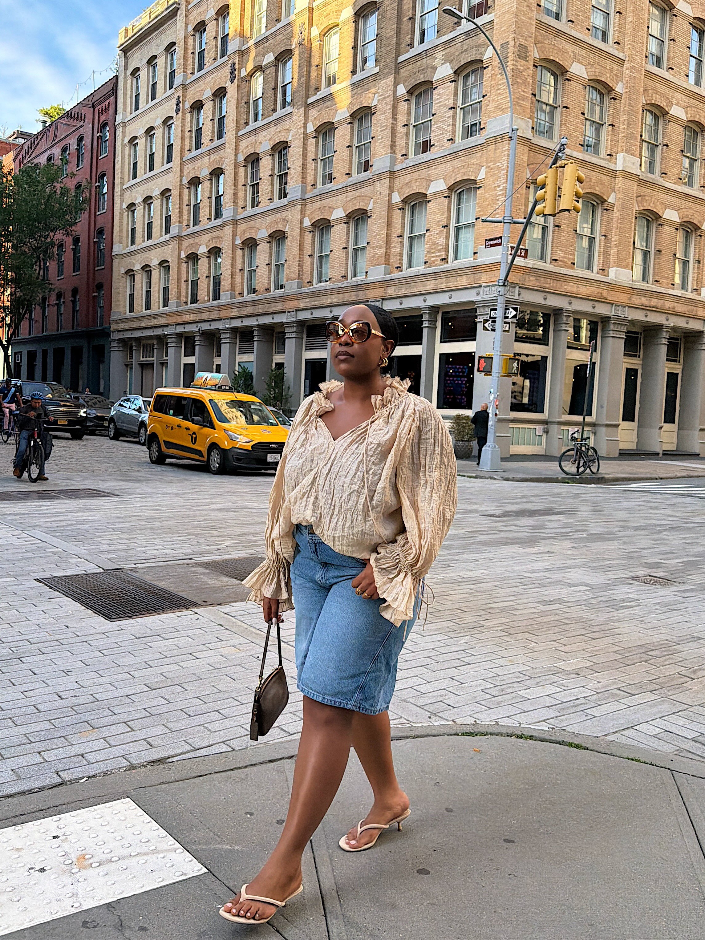 A woman wearing light-latte shoes in summer 2026.