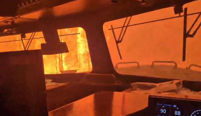 Horrifying video shows train car engulfed in wildfire flames with crew on board