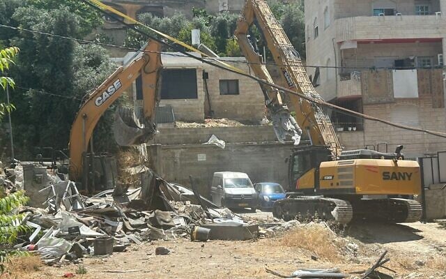 A bulldozer demolishes a home in the al-Bustan neighborhood of East Jerusalem, May 25, 2026 (Courtesy/Al-Bustan community)