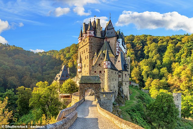 Eltz Castle is a medieval castle nestled in the hills in Germany