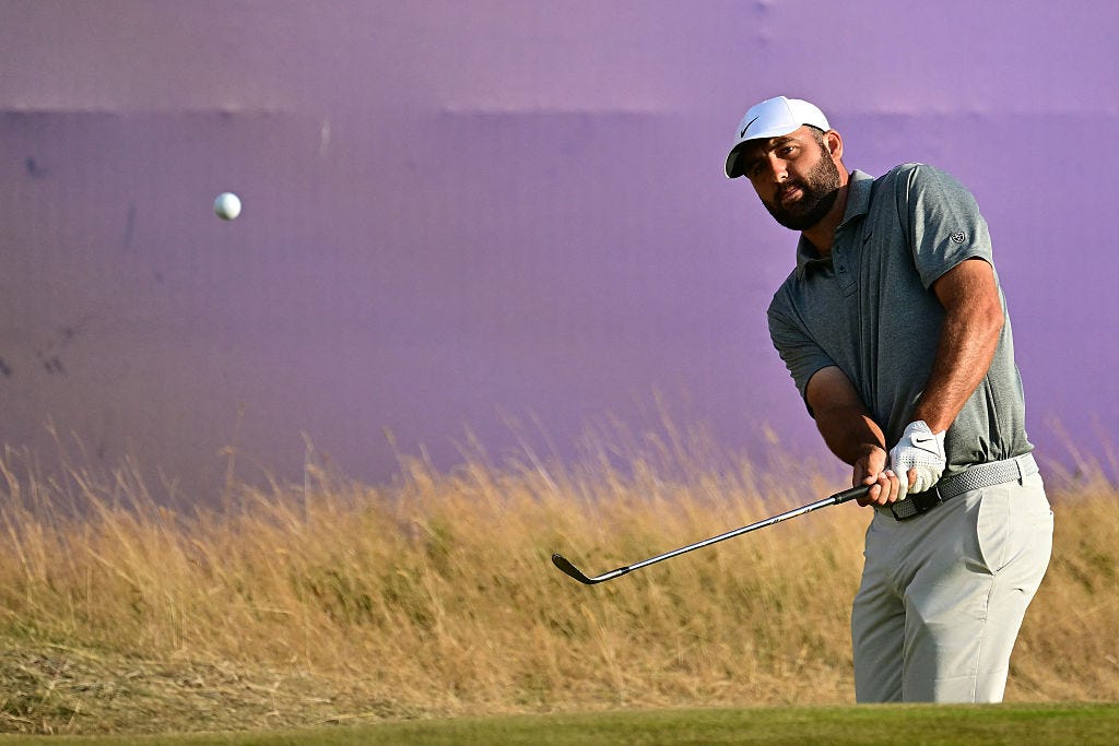 Scottie Scheffler chips onto the 18th green on day three of the 154th Open Golf Championship at Royal Birkdale Golf Club near Southport in north-west England on July 18, 2026.