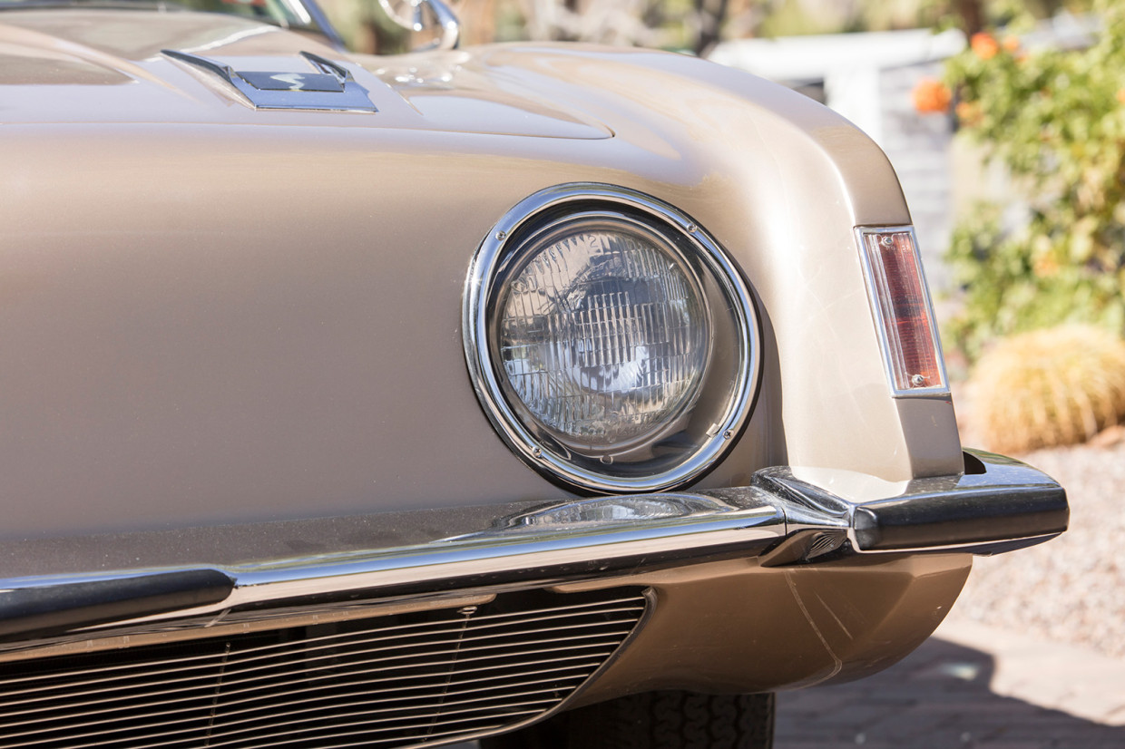 The Studebaker Avanti classic car’s round headlights