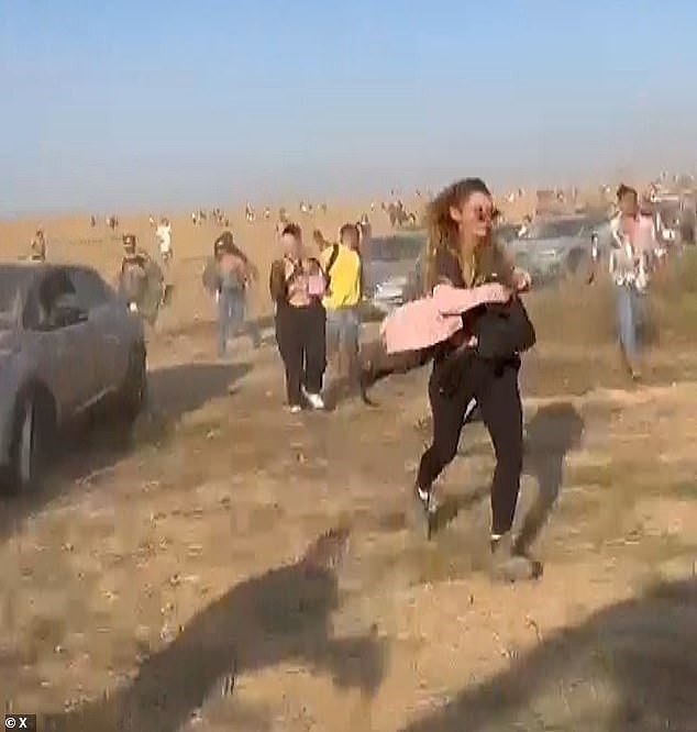 People fleeing from the Nova Music Festival during the October 7, 2023 Hamas attack on Israel