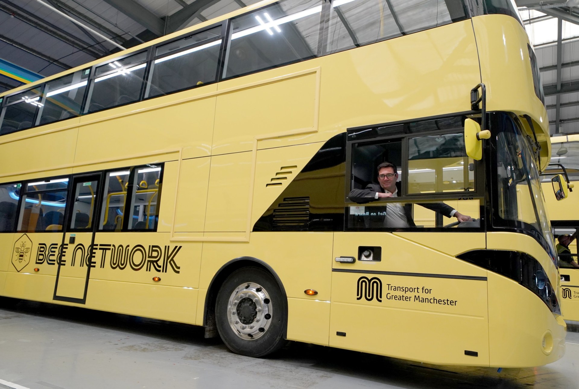 File photo dated 02/06/23 of Mayor of Greater Manchester Andy Burnham views the 'Bee Network' buses at manufacturer Alexander Dennis in Larbert, Falkirk.